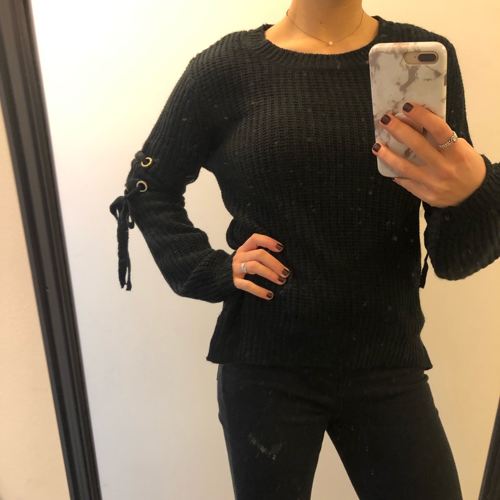 Black sweater with arm ties